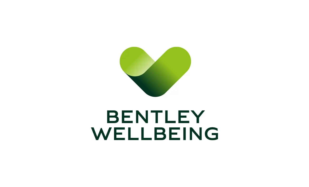 The Bentley Wellbeing logo featuring a sleek green heart shape.