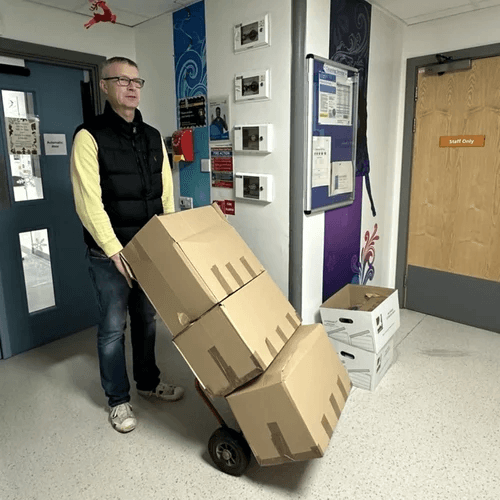 Man delivering donations to LRI Children's cancer ward